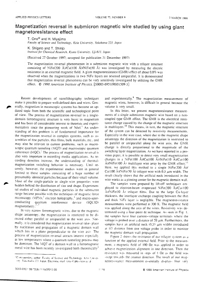 Magnetization reversal in submicron magnetic wire studied by using giant magnetoresistance effect