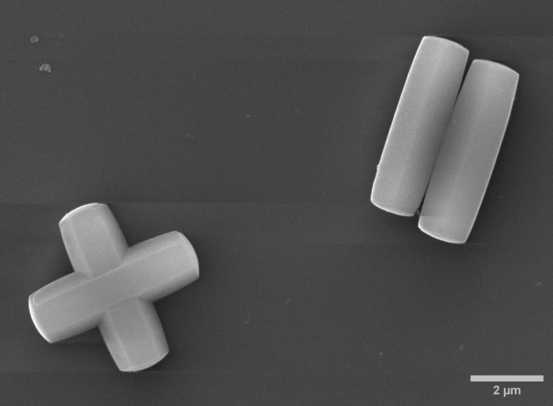 TITLE: Symbols in Structure: Plus and Minus in NU-1000; SUBJECT: Rod-shaped NU-1000 particles align to form shapes reminiscent of plus and minus symbols.; CREDIT: Arshia Sulaiman, Virginia Tech; METHOD/INSTRUMENT: JEOL SEM