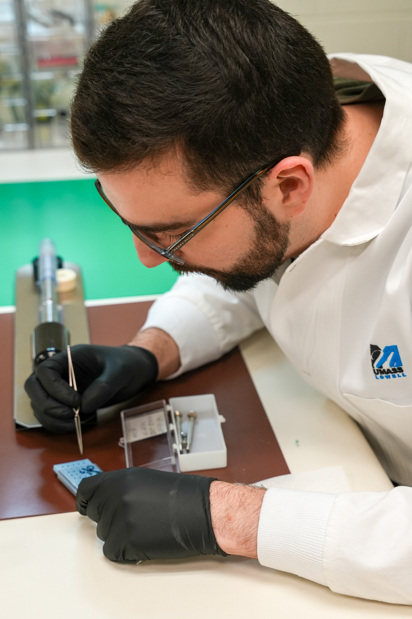 Anthony Branco prepares a sample for analysis