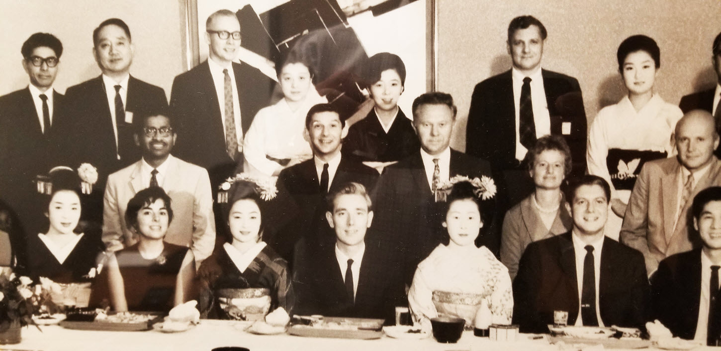 Photo taken at a dinner held during the 1966 International Conference on Electron Microscopy (ICEM) in Kyoto. Tom Huber (second from the right, bottom row) and Kenji Kazato. JEOL Ltd. founder and President at that time (second from the left, back row). Tom was the National Sales Manager at the time.
